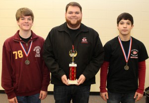 Eighth grade gold winners are, from left, Tanner DeYoung, adviser Justin Odom and Michael Franks, Clinton Junior High.