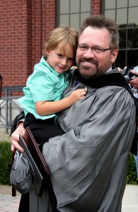 Danny McMullen of Brandon celebrates his graduation with his grandson Ethan McMullen. Danny graduated with his Nursing degree from the Hinds Community College Vicksburg campus.