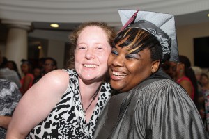 Michaele Duke congratulates her friend Jasmine Monroe, right, of Jackson after her May 15 graduation from Hinds Community College.