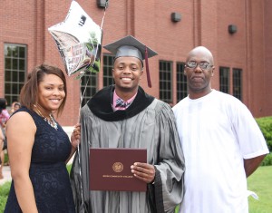 Develle Collier of Brandon, center celebrates his degree with soon-to-be-fiancé Kanesha McAllister, left, and his dad Clyde McAfee. Collier plans to major in business administration at Belhaven College.