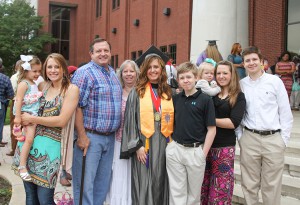 Mary Catherine Harvey of Forest is surrounded by her family after graduating from Hinds Community College on May 15. Harvey represented Hinds Community College in the HEADWAE event in February and is an officer in the Raymond Campus chapter of Phi Theta Kappa.