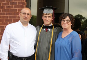 Andrew Bailey Coomes of Vicksburg graduated from Hinds Community College on May 15 and plans to major in marine biology at the University of Southern Mississippi. With him are his parents John and Kim Coomes.