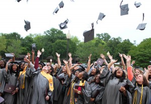 Happy graduates at the May 14 Associate Degree Nursing ceremony at Hinds Community fling their hats in the air.