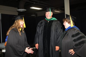 The speaker for the nursing and allied health graduation ceremony at Hinds Community College on July 30 was Dr. Bryan Lantrip. Flanking him are, left, Christie Bokros, assistant dean for allied health programs, and, right, Dr. Libby Mahaffey, dean for nursing and allied health programs.