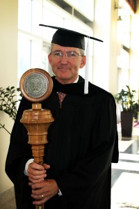 New retiree Hinds Community College George Thrash of Raymond was the grand marshal and mace bearer for the July 30 graduation ceremonies at the Muse Center on the Rankin Campus.