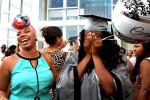 Cherrie Wells, left, surprised her cousin Danielle Cross of Clinton for her graduation from Hinds Community College on July 30 with a degree in dental assisting.