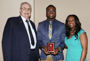 D'Cha'Ray Brown, center, was among Hinds Community College Students recognized with a departmental award April 15. Apple received an Associated Student Government Award for the Raymond Campus, presented by Hinds President Dr. Clyde Muse, left, and Director of Dual and Special Enrollment Vanda Brumfield, right.
