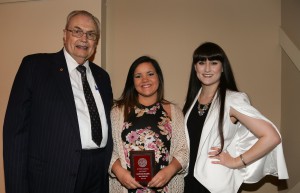 Sara Katherine Dew, center, was among Hinds Community College Students recognized with a departmental award April 15. Dew received an Outstanding Student Award for Marketing/Fashion Merchandising, presented by Hinds President Dr. Clyde Muse, left, and instructor Gabrielle Woodward, right.