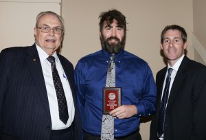 Ronald Helms, center, was among Hinds Community College students recognized with a departmental award April 15. Helms received an Outstanding Student Award for IST Computer Network Technology by Hinds President Dr. Clyde Muse, left, and instructor David Rose, right.