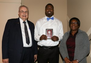 Jarvis Jones, center, was among Hinds Community College students recognized with a departmental award April 15. Jones received an Outstanding Student Award for Psychology from Hinds President Dr. Clyde Muse, left, and instructor Dr. Gloria Daniels, right.