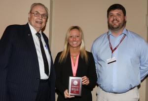 Christin Lang, center, was among Hinds Community College students recognized with a departmental award April 15. Lang received an ASG Leadership-Nursing/Allied Health Award from Hinds President Dr. Clyde Muse, left, and instructor Cooper McCachren, right.