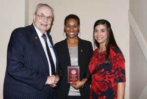 Shanika Nelson, center, was among Hinds Community College students recognized with a departmental award April 15. Nelson received an Outstanding Student Award for Education presented by Hinds President Dr. Clyde Muse, left, and instructor Jennifer Rodgers, right.