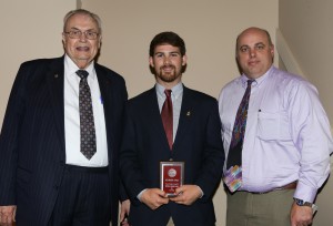 Taylor Pace, center, was among Hinds Community College students recognized with a departmental award April 15. Pace received an ASG Leadership-Vicksburg-Warren Campus award from Hinds President Dr. Clyde Muse, left, and Vicksburg Warren Campus Dean Marvin Moak, right.