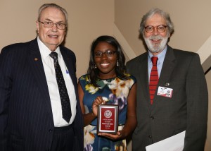 Ada Marie White, center, was among Hinds Community College students recognized with a departmental award April 15. White received an Outstanding Student Award in Interpreter Training Technology, presented by Hinds President Dr. Clyde Muse, left, and Rankin Campus Academic Dean Gary Fox, right.