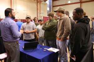 Students speak with Russell Branch, of Goodyear Commercial Tire, at Jobs for Eagles, a job fair on the Raymond Campus for Hinds students, on Wednesday, April 13, 2016. The Diesel Technology students are, from left, Garrett Adcock, of Byram; Hunter Tisdale, of Brandon; Trent Craft, of Magee; Noah Christy, of Byram; and Bronson Devine, of Jackson. (April Garon/Hinds Community College)