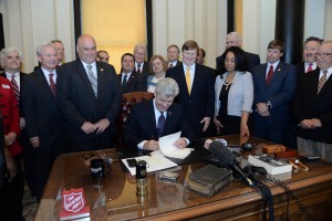 Photo courtesy of Hinds alumnus Greg Campbell Gov. Phil Bryant — surrounded by workforce development leaders, legislators including Rep. Deborah Butler Dixon of Raymond and Rep. Alex Monsour of Vicksburg as well as community college and university officials — signed the Workforce Development Bill on March 21.