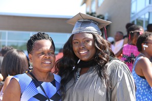 Alexis Noble, of Vicksburg, received an associate degree from Hinds Community College in Fashion Merchandising during graduation ceremonies at the Clyde Muse Center on Friday, May 13, 2016. At left is her mother, Rosetta Noble. (April Garon/Hinds Community College)