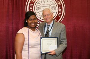 Tainekia Dixon, with Academic Dean Dr. Tom Kelly.