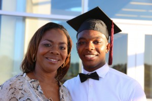 Christian Donaldson, right, earned 26 college credit hours by earning his high school diploma from Brandon High School through the Gateway to College Program at Hinds Community College's Rankin Campus. At left is his mother, Priscilla. (April Garon/Hinds Community College)