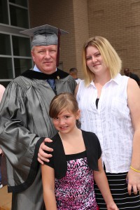 Jeffery Walters of Jackson received a certificate in the paramedic program. At age 49, he already works for AMR in Jackson. Celebrating with him are his daughter, Lacey Walters and granddaughter Karri Walters.