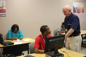 Logistics Technology instructor Dennis Thompson assists student Isaiah Jackson during class at Hinds Community College Jackson Campus-Academic/Technical Center. (Hinds Community College/April Garon)
