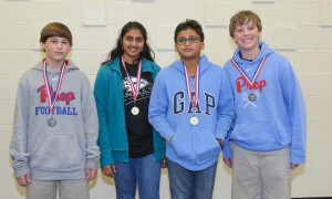 Winning individual awards for seventh grade were, from left, first place, Thomas Wasson of Madison, Jackson Preparatory School; second place, Abigail Varsheese, Clinton Junior High School; third place, Abhay Chenuku, Clinton Junior High; fourth place, Worth Hewitt of Jackson, Jackson Preparatory School.