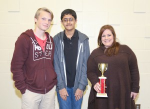 Winning the eighth grade gold award was Clinton Junior High including, from left, Caleb Miller, Saatvik Agrawal and sponsor Christi Oswalt.
