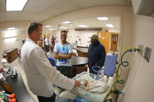 Corey Lilley, a senior at Terry High School, observes a demonstation in the Respiratory Care Technology laboratory during the 2017 Spring Nursing Showcase on March 2 at Hinds Community College Jackson Campus-Nursing/Allied Health Center. Tilley is flanked by his parents, Loretta and Marvin Lilley. (Hinds Community College/April Garon)