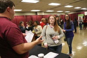 Paula Palmertree, center foreground, visits with nursing program coordinators during the Spring 2017 Nursing Showcase on March 2 at Hinds Community College Jackson Campus-Nursing Allied Health Center. (Hinds Community College/April Garon)