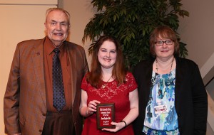 Anna Hite, center, of Raymond, was among Hinds Community College students recognized with a departmental award April 21. Hite received an Outstanding Student Award for English, presented by Hinds President Dr. Clyde Muse, left, and instructor Tammy McPherson, right. (Hinds Community College/April Garon)