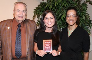 Molly Dallas, center, of Madison, was among Hinds Community College students recognized with a departmental award April 21. Dallas received an Outstanding Student Award for Associate Degree Nursing, presented by Hinds President Dr. Clyde Muse, left, and instructor Carolyn Holloway, right. (Hinds Community College/April Garon)