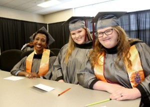 Darya Thompson of Jackson, left, Taylor Tullos of Clinton and Abigail West of Hamilton graduated from Hinds Community College on May 12.