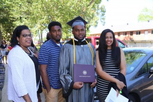 Graduate Justin Hall of Indianola, center, receives his degree in residential services on May 14. Shown here with his family from left, Chandra Hall, Jason Hall and, Danielle Hall, right, also from Indianola.