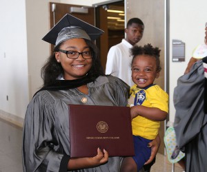 Marquieniece Butler of Jackson is joined by her son Calvin Alexander Jr. In celebrating her Health Care Assisting degree from Hinds Community College on May 12.
