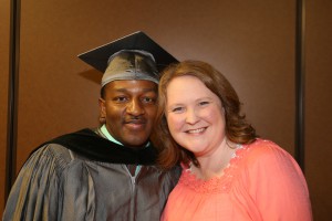 Photo 12 – Felix Davis, left, of Jackson, shares a moment with Dr. Robin Parker graduation ceremonies May 12 at the Muse Center at Hinds Community College Rankin Campus. Davis earned technical and career certificates this past semester after earning his High School Equivalency through the MI BEST program at Hinds. Parker is assistant dean for Career and Technical Education on the Raymond Campus. (Hinds Community College/April Garon)