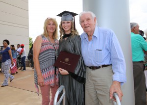 Casey Brown, center, of Lucedale, was among 464 students who received credentials from Hinds Community College during summer graduation ceremonies July 28 at the Muse Center on the Rankin Campus. She earned an Associate of Applied Science degree in Veterinary Technology. With her are her mother, Julie, left, and grandfather Kenneth Sullivan. (Hinds Community College/April Garon)