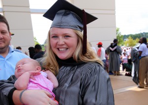 Christin Coyle, of McComb, was among 464 students who received credentials from Hinds Community College during summer graduation ceremonies July 28 at the Muse Center on the Rankin Campus. She earned an Associate of Applied Science degree in Veterinary Technology. With her is her daughter, Camryn. (Hinds Community College/April Garon)