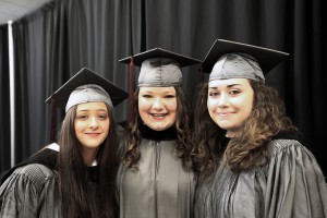 Ashley Ramirez, left, of Cleveland; Brittnee Pierce, center, of Harrisville, and Hope Sloan, of Philadelphia, were among 464 students who received credentials from Hinds Community College during summer graduation ceremonies July 28 at the Muse Center on the Rankin Campus. All earned a Associate of Applied Science degrees in Veterinary Technology. (Hinds Community College/April Garon)