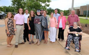 Shelby Cunningham, center, of Raymond, was among 464 students who received credentials from Hinds Community College at summer graduation ceremonies at the Muse Center on the Rankin Campus. From left- Kylee Cunningham, Skylar Cunningham, Van McDaniel, Christy Cunningham, Aaron Blakely, Nikki Ryan, Roxie Williams,Triston Cunningham,Theresa Ryan, Roger Jones and Lois Jones. (Hinds Community College/April Garon)
