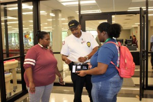 Chief Percy Terrell helped to point a mom and daughter team in the right direction during the Aug. 14 first Day of school activities.