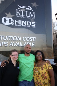 Byron Davis, center, completed the KLLM Driving Academy program this past summer and is now a lead solo driver with the company. With him are Charli Vos, an interpreter with the Mississippi Department of Rehabilitation Services, left, and Loretta Sutton, an interpreter and coordinator in Disability Support Services with Hinds Community College, right. (Hinds Community College/April Garon)