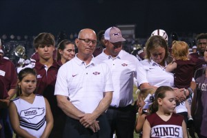 Gene Murphy surrounded by family members including son Kelly Murphy, an assistant football coach, and wife Dot Murphy, specialists coach, as the announcement is made that Hinds Community College named the football field Gene Murphy Field. (April Garon/Hinds Community College)